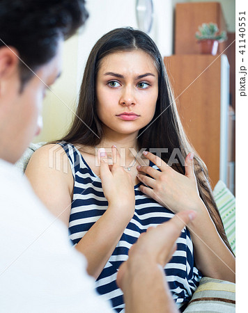 Quarrel between young spouses at home. Quarrel between young spouses at home. 41140551