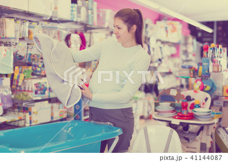 woman is choosing baby towel 41144087