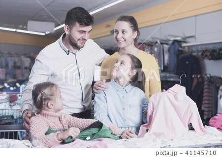Family buying children clothes Family buying children clothes 41145710