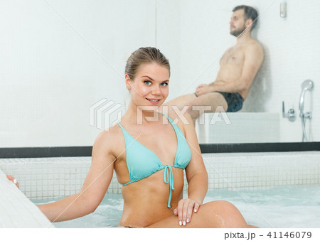 Woman posing in jacuzzi Woman posing in jacuzzi 41146079
