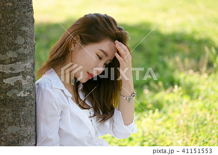Taking a rest below tree with a sunny day Taking a rest below tree with a sunny day 41151553