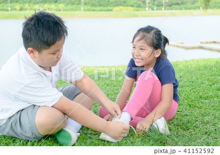 Happy sister smiles to her brother Happy sister smiles to her brother 41152592