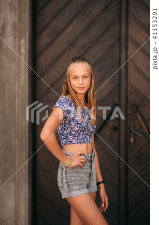 teenage female in a summer time spend time near the art school teenage female in a summer time spend time near the art school 41153291