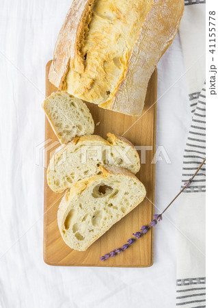 Top View of Sliced Artisan Rustic Bread on Board Top View of Sliced Artisan Rustic Bread on Board 41155778