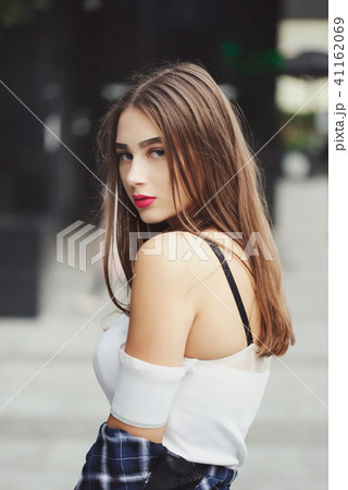 beautiful brunette girl on the street beautiful brunette girl on the street 41162069