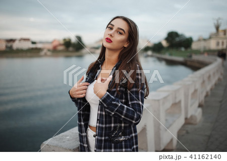 beautiful brunette girl on the street 41162140