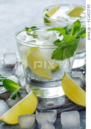 Ice drink with lime and fresh mint. Ice drink with lime and fresh mint. 41162230