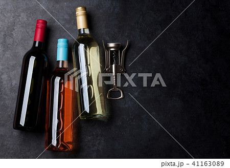 Red, rose and white wine bottles 41163089