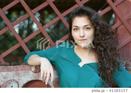 beautiful woman posing in summer forest beautiful woman posing in summer forest 41163157