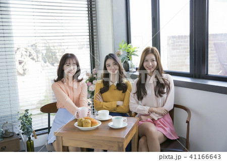 friendship, shopping and tea time in cafe concept photo, happy friends having fun together. 244 41166643