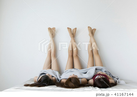 friendship, pajama party and make-up concept, happy friends having fun together. 127 friendship, pajama party and make-up concept, happy friends having fun together. 127 41167144