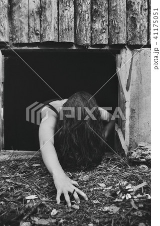 girl on the floor with hair on her face crawlin 41175051