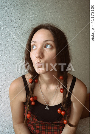 blue-eyed girl with cherries 41175100