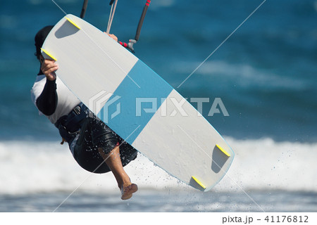 Kite surfing man jump on the sea 41176812