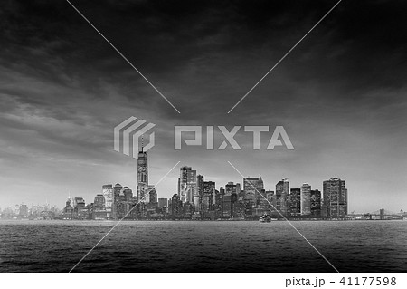 Panoramic view of storm over Lower Manhattan from Ellis Island at dusk, New York City. 41177598