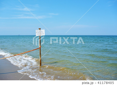 Warning Sign on the beach of the nature reserve at the mouth of the river Bevano Warning Sign on the beach of the nature reserve at the mouth of the river Bevano 41178405