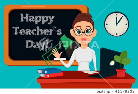 Teacher sitting at her desk while lesson 41179205