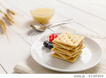 crackers with condensed milk and fruit, breakfast crackers with condensed milk and fruit, breakfast 41185920