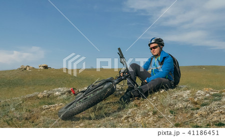 Fat bike also called fatbike or fat-tire bike in summer driving the hills. 41186451