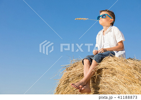 Happy little boy playing in the park at the day time. 41188873