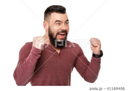 happy bearded football fan celebrating. 41189406