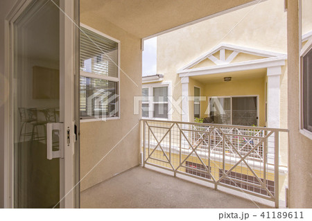 Sliding glass doors looking out onto the patio Sliding glass doors looking out onto the patio 41189611