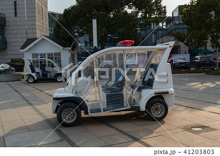 Small white electric police car, patrol buggy  41203803