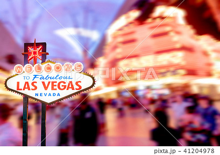 Famous Las Vegas sign with blur cityscape 41204978