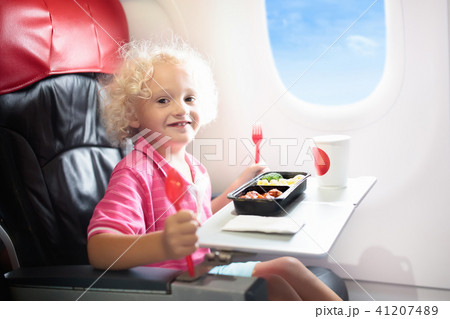 Child in airplane. Kids fly. Children flight meal 41207489