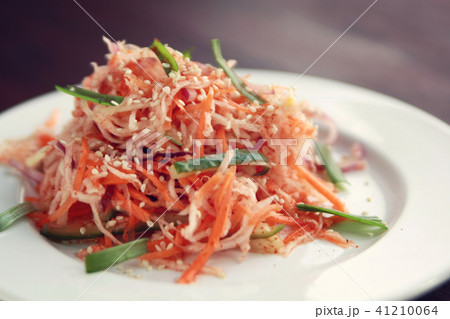 Vegan salad with carrot and radish. Asian cuisine. Vegan salad with carrot and radish. Asian cuisine. 41210064