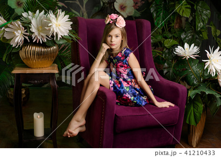 Teenager girl in flower wreath 41210433