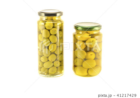 Green olives two glass jar isolated on white Green olives two glass jar isolated on white 41217429