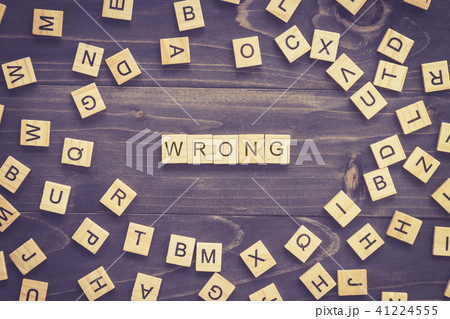 Wrong word wood block on table for business 41224555