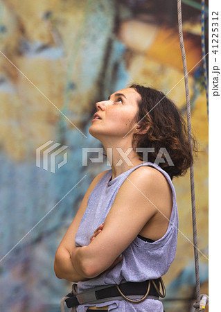 girl climbing up the wall girl climbing up the wall 41225312