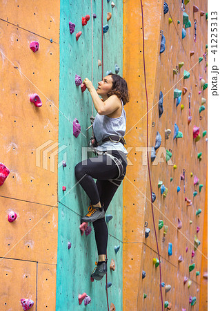 girl climbing up the wall girl climbing up the wall 41225313