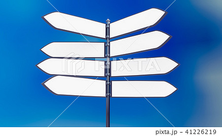 signpost in front of blue sky with blank arrows 41226219