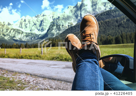 Girl legs sticking out of the car 41226405