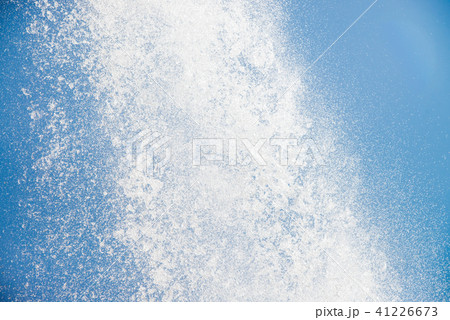 Strong flow of water on blue sky background, closeup 41226673