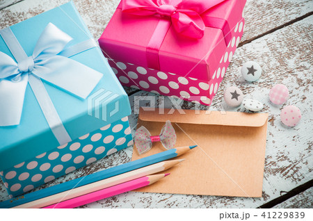 Empty envelope with blue and pink pencils Empty envelope with blue and pink pencils 41229839