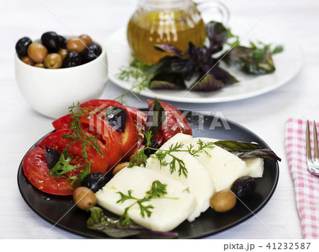 White cheese with tomatoes, green and black olives 41232587