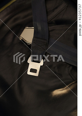 Seat belt on seat shot in airplane. Seat belt on seat shot in airplane. 41235737