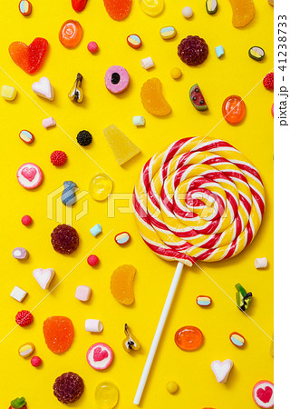colorful candy on the yellow background 41238733