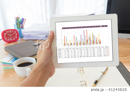 Hand holding tablet Hand holding tablet 41243620