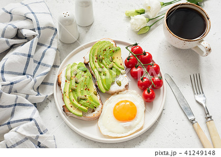 Breakfast with avocado toast, egg and coffee 41249148