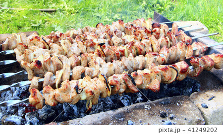 Appetizing shashlik outside.Process of cooking mea Appetizing shashlik outside.Process of cooking mea 41249202