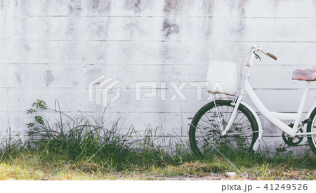 Bicycle over white wall Bicycle over white wall 41249526