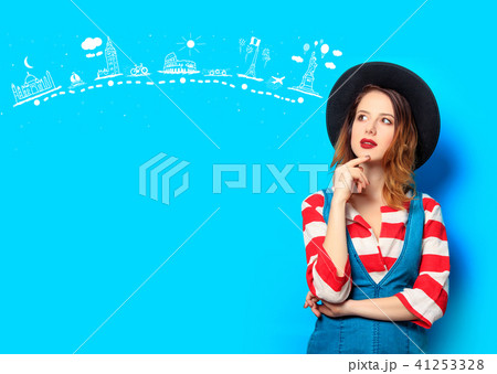 young smiling red-haired woman with travel route young smiling red-haired woman with travel route 41253328