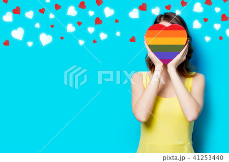 young woman with box with hearts young woman with box with hearts 41253440