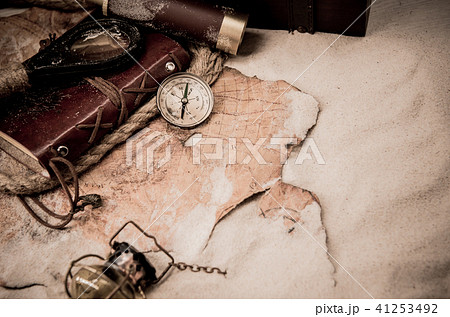 Columbus day. Pirates and treasure with worldmap 41253492