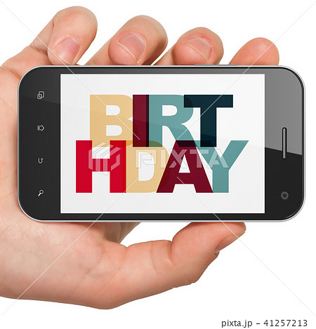 Holiday concept: Hand Holding Smartphone with Birthday on  display 41257213